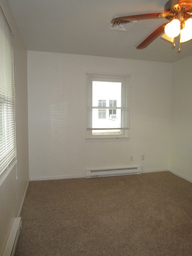 carpeted empty room featuring a baseboard radiator and ceiling fan