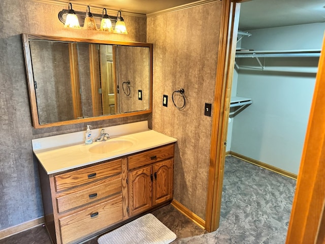 1516 W Missouri St, Kirksville, MO 63501 - bathroom featuring vanity, baseboards, and a spacious closet