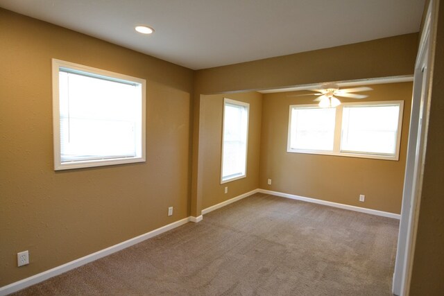 1415 E Patterson St, Kirksville, MO 63501 - carpeted spare room featuring baseboards and recessed lighting