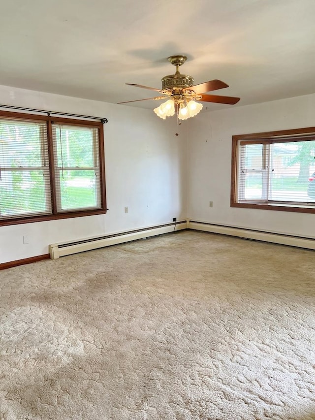 904 E George St, Kirksville, MO 63501 - carpeted empty room featuring ceiling fan and baseboard heating