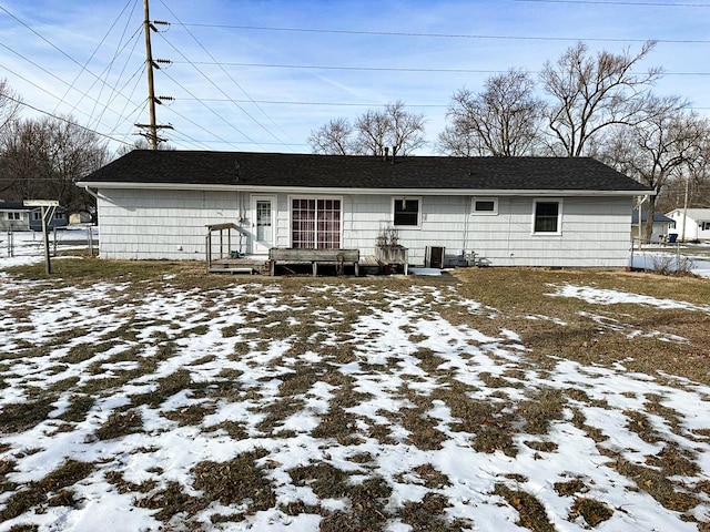 view of snow covered house