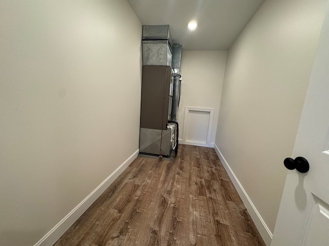 22585 State Highway K, Novinger, MO 63559 - hallway with dark wood finished floors and heating unit