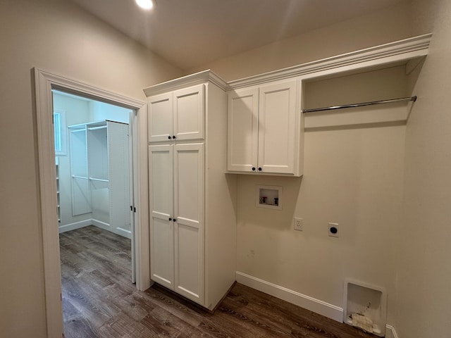 22585 State Highway K, Novinger, MO 63559 - laundry area featuring hookup for a washing machine, hookup for an electric dryer, dark wood-style flooring, cabinet space, and recessed lighting