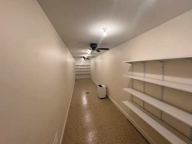 22585 State Highway K, Novinger, MO 63559 - hallway featuring baseboards and a textured ceiling
