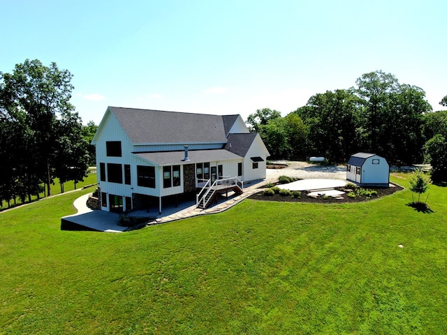 22585 State Highway K, Novinger, MO 63559 - rear view of house with a patio area, a shed, a lawn, and stairs