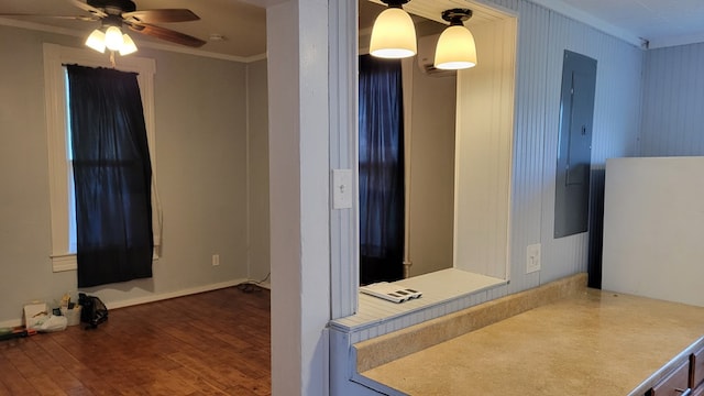 507 W Illinois St, Kirksville, MO 63501 - bathroom with crown molding, hardwood / wood-style flooring, and a ceiling fan