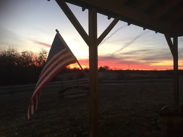 view of yard at dusk