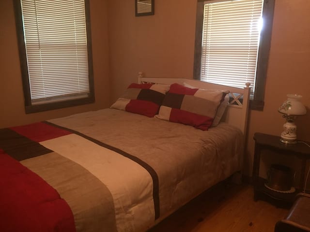 bedroom featuring wood-type flooring