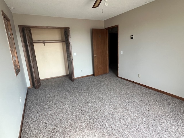 unfurnished bedroom with a ceiling fan, carpet, a closet, and baseboards