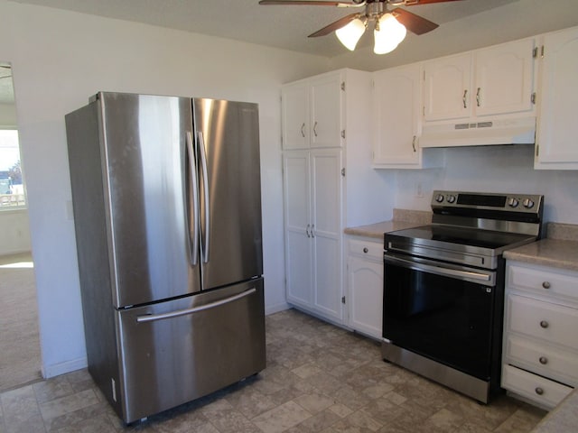 kitchen with appliances with stainless steel finishes, light countertops, white cabinets, and under cabinet range hood