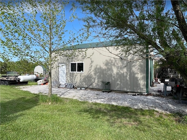 view of home's exterior featuring a lawn