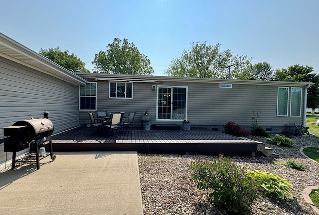 210 N Grant St, Green City, MO 63545 - rear view of property featuring a deck and outdoor dining space