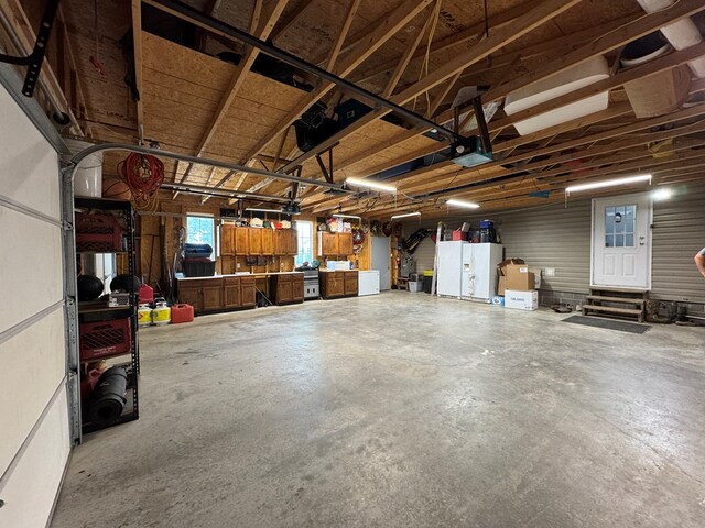 210 N Grant St, Green City, MO 63545 - garage featuring a workshop area