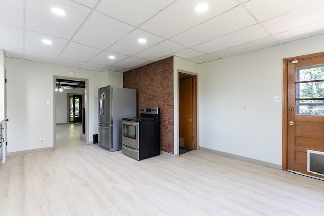 516 Barrow St, Moberly, MO 65270 - kitchen featuring appliances with stainless steel finishes, light wood-style floors, baseboards, a paneled ceiling, and recessed lighting