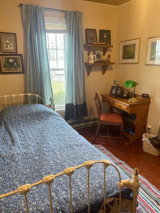 411 W W, Callao, MO 63534 - bedroom featuring wood finished floors and multiple windows
