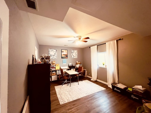 office with ceiling fan and dark hardwood / wood-style flooring