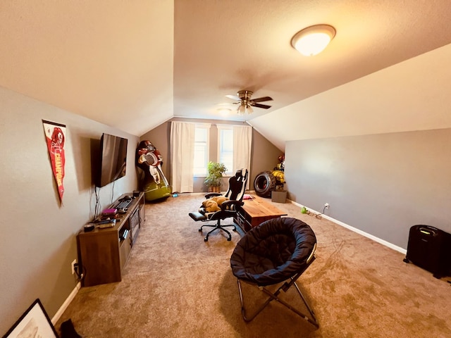 playroom with carpet floors, ceiling fan, and vaulted ceiling