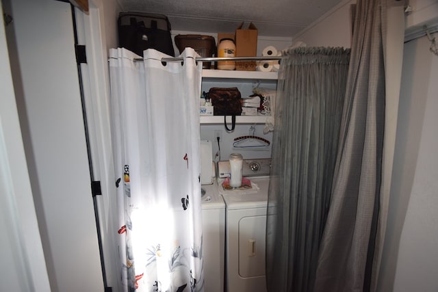 washroom with independent washer and dryer and ornamental molding