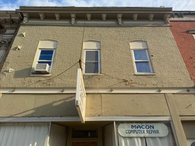 view of side of home with cooling unit