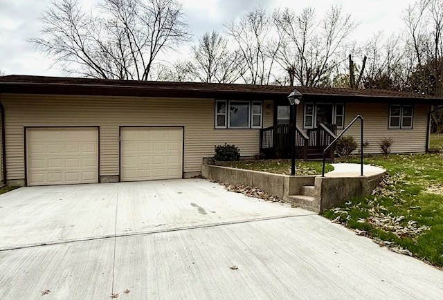 ranch-style home featuring a garage