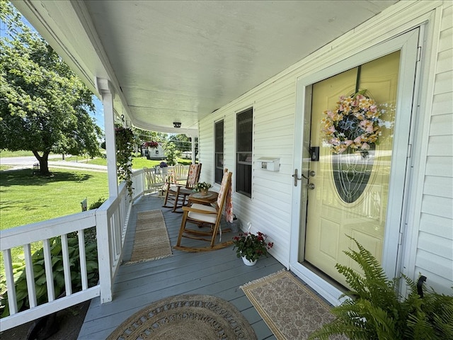 411 S Macon St, Bevier, MO 63532 - porch with a lawn