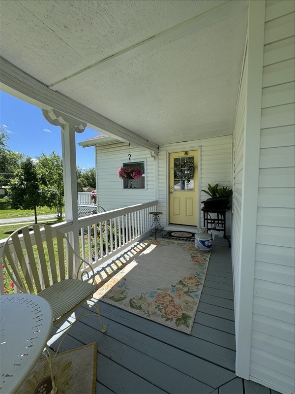 411 S Macon St, Bevier, MO 63532 - view of wooden porch