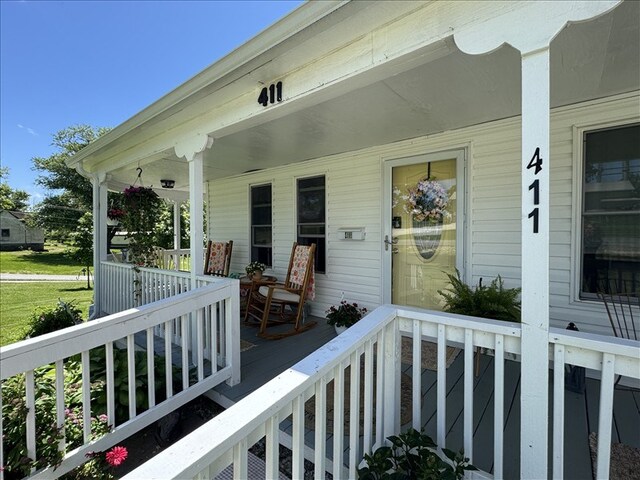 411 S Macon St, Bevier, MO 63532 - doorway to property with a porch