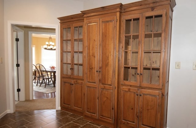 2110 Woodcrest Dr, Chillicothe, MO 64601 - detailed view of a chandelier and baseboards