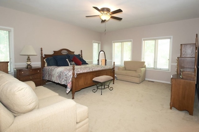 2110 Woodcrest Dr, Chillicothe, MO 64601 - bedroom with light colored carpet, baseboards, and ceiling fan