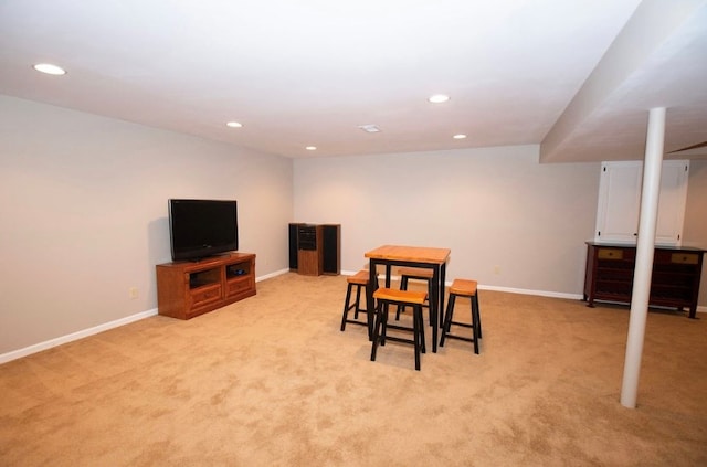 2110 Woodcrest Dr, Chillicothe, MO 64601 - dining area featuring light carpet, recessed lighting, and baseboards