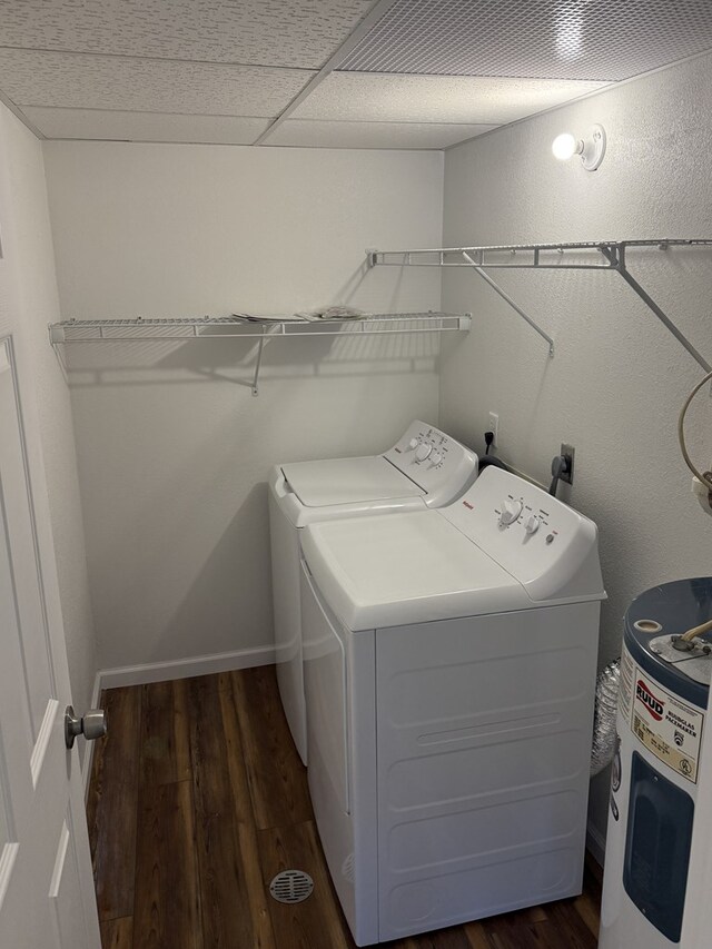 706 Woodwinds Ct, Kirksville, MO 63501 - laundry area with baseboards, dark wood finished floors, laundry area, and washer and clothes dryer