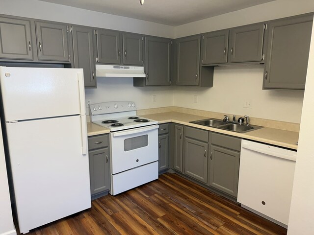 706 Woodwinds Ct, Kirksville, MO 63501 - kitchen with under cabinet range hood, gray cabinets, white appliances, and a sink