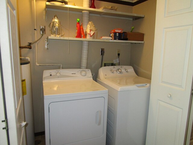 102 Woodwinds Ct, Kirksville, MO 63501 - laundry area with laundry area, water heater, and washer and clothes dryer