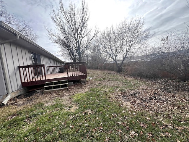 view of yard featuring a wooden deck