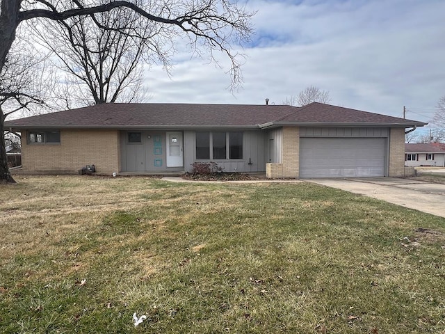 single story home featuring a garage and a front lawn