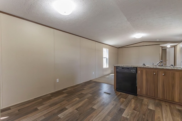 1018 Logue Ln, Keytesville, MO 65261 - kitchen featuring dark wood-type flooring, dishwasher, visible vents, and lofted ceiling