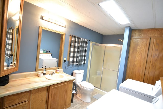 49615 Peach Rd, Milan, MO 63556 - full bathroom with washing machine and clothes dryer, a shower stall, and toilet