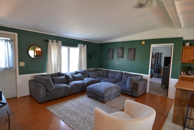 49615 Peach Rd, Milan, MO 63556 - living area featuring wood finished floors, lofted ceiling, a ceiling fan, and crown molding
