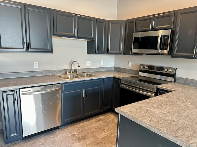 kitchen with sink and stainless steel appliances