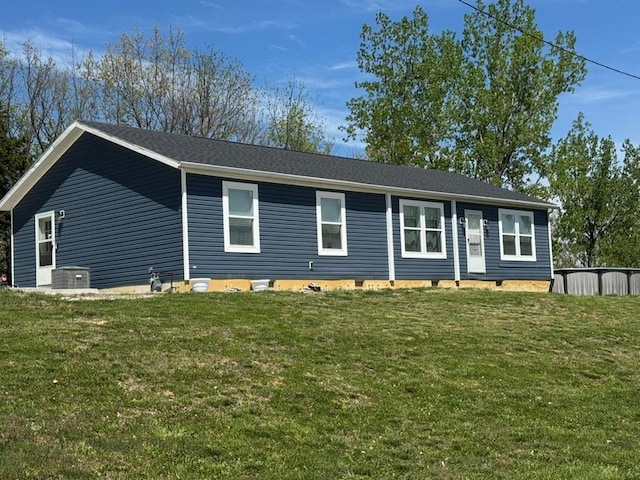 501 SE State St, Milan, MO 63556 - view of front of property with central AC and a front yard