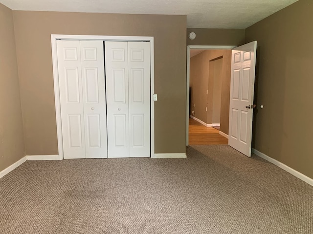 615 N Elson St, Kirksville, MO 63501 - unfurnished bedroom with carpet flooring and a closet