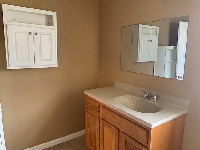 615 N Elson St, Kirksville, MO 63501 - bathroom featuring vanity and tile patterned flooring