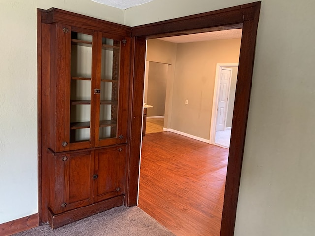 615 N Elson St, Kirksville, MO 63501 - hall with baseboards and light wood-style floors