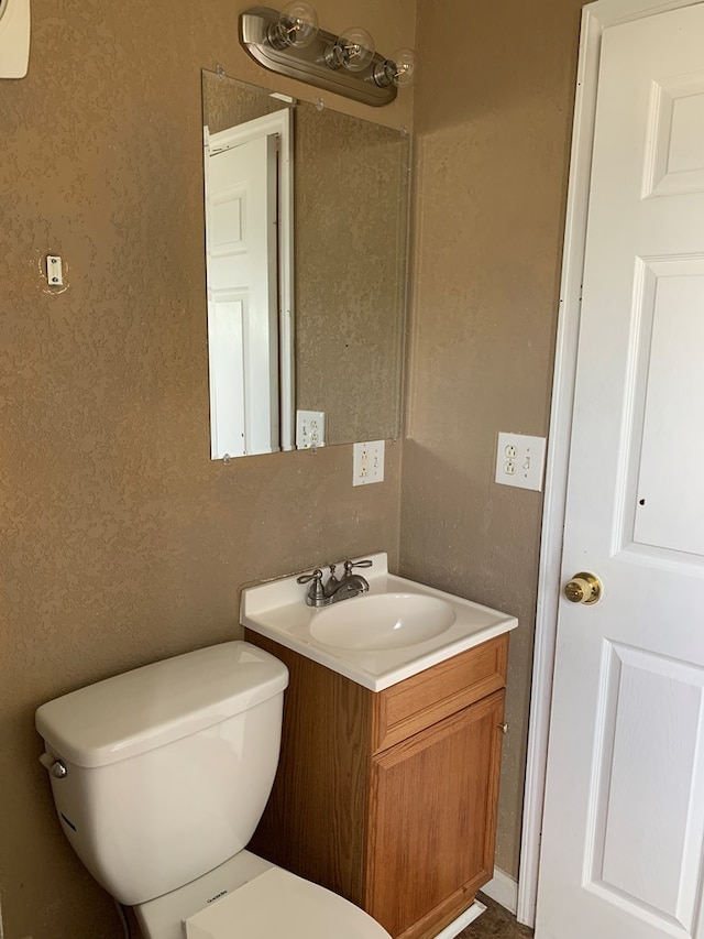 615 N Elson St, Kirksville, MO 63501 - bathroom featuring vanity and toilet