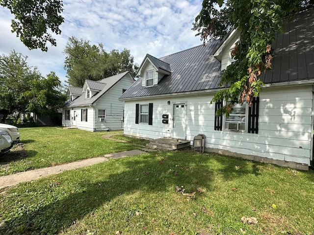 view of front of home with a front yard