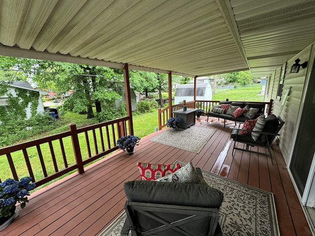 72 Manor Crest Dr, Kirksville, MO 63501 - wooden terrace featuring a lawn and an outdoor hangout area