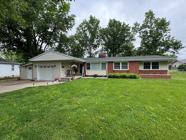 72 Manor Crest Dr, Kirksville, MO 63501 - ranch-style house with concrete driveway, an attached garage, brick siding, a front yard, and a chimney