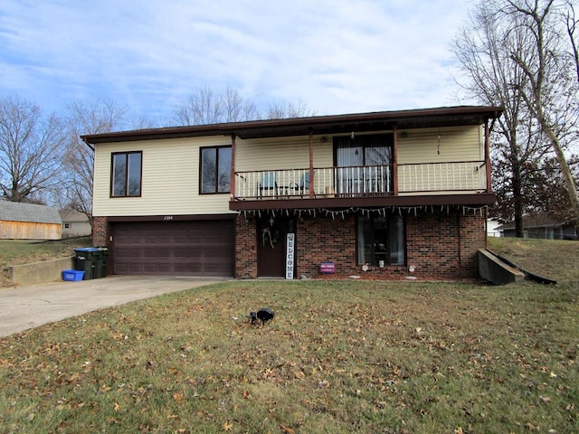 front facade with a front lawn, a deck, and a garage