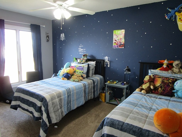 bedroom with multiple windows, carpet floors, and ceiling fan