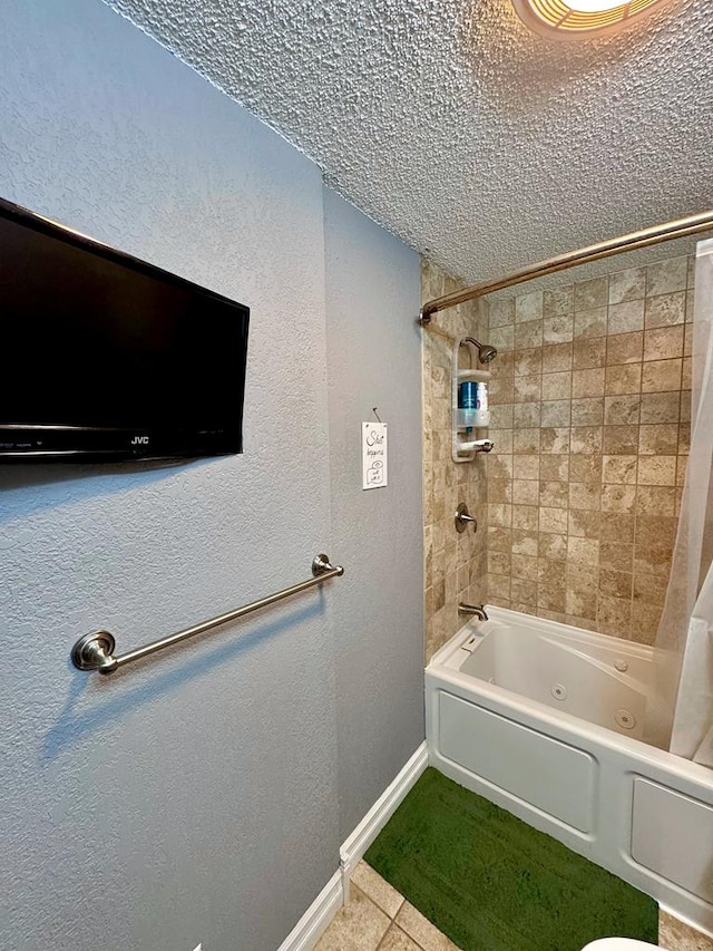 bathroom featuring tile patterned flooring, a textured ceiling, and shower / tub combo with curtain